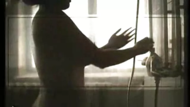 A mature blonde jerks off a pussy and sucks a gentleman's dick at porno au douche the same time